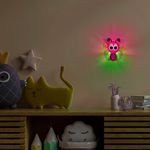 luz-noturna-taschibra-led-farfalla-com-sensor-com-controle-da-luz-0-5w-bivolt-rosa-2.jpg
